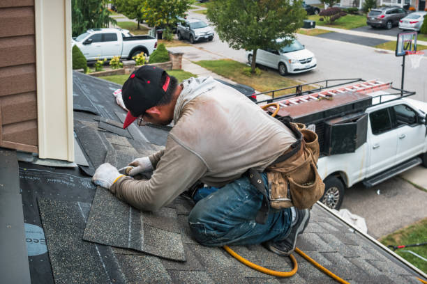 Professional Roof Repair technician working in Interlochen, MI